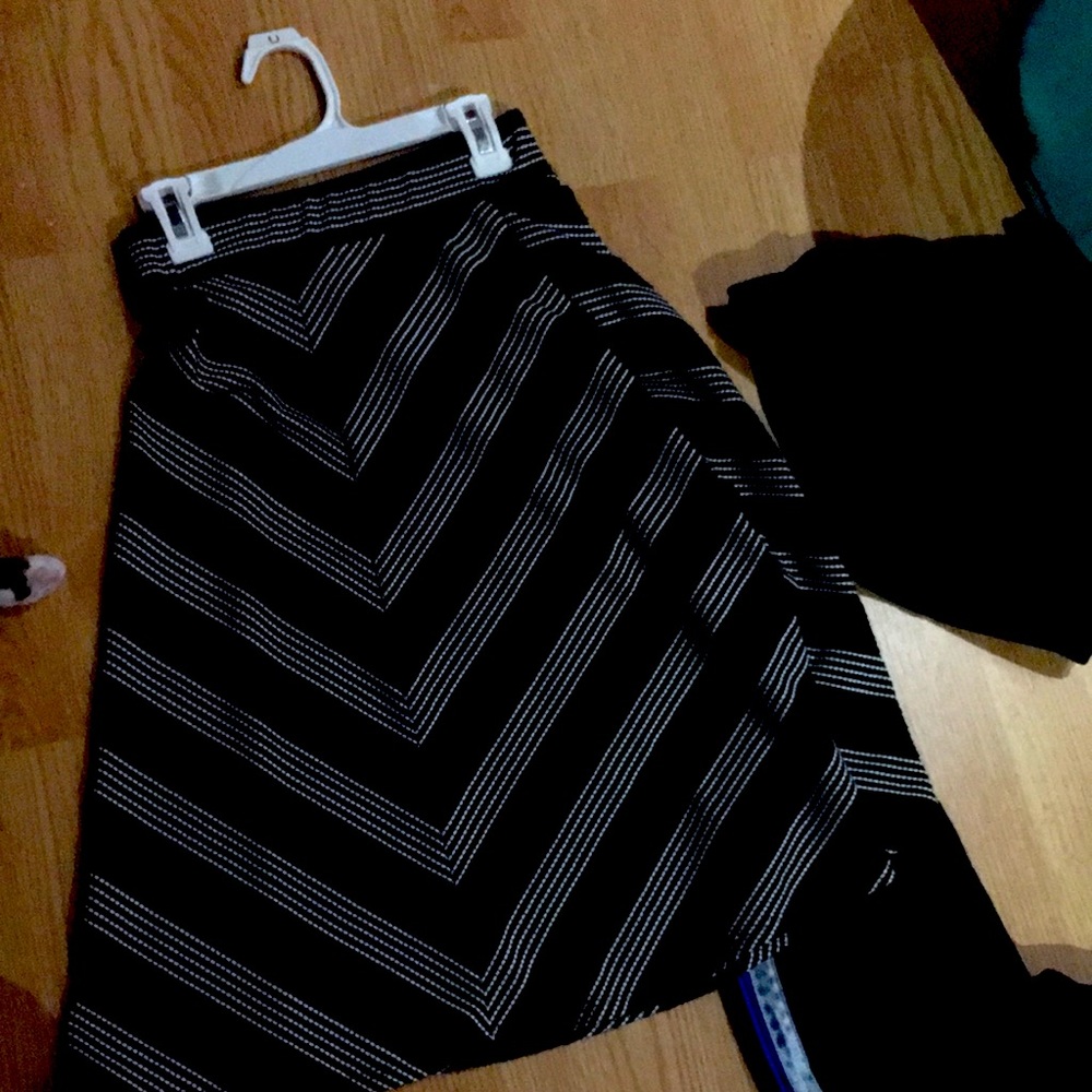Long, black and white stripped skirt.